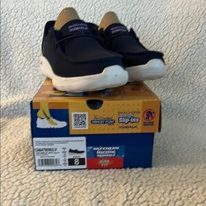 SKECHERS NAVY GO WALK SLIP INS. size 8